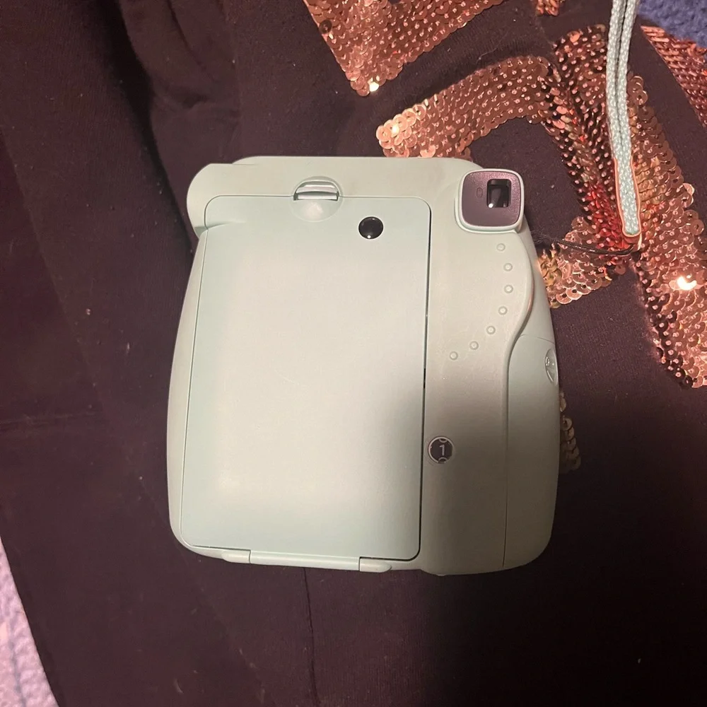 Mint green instax mini 9 instant picture camera
